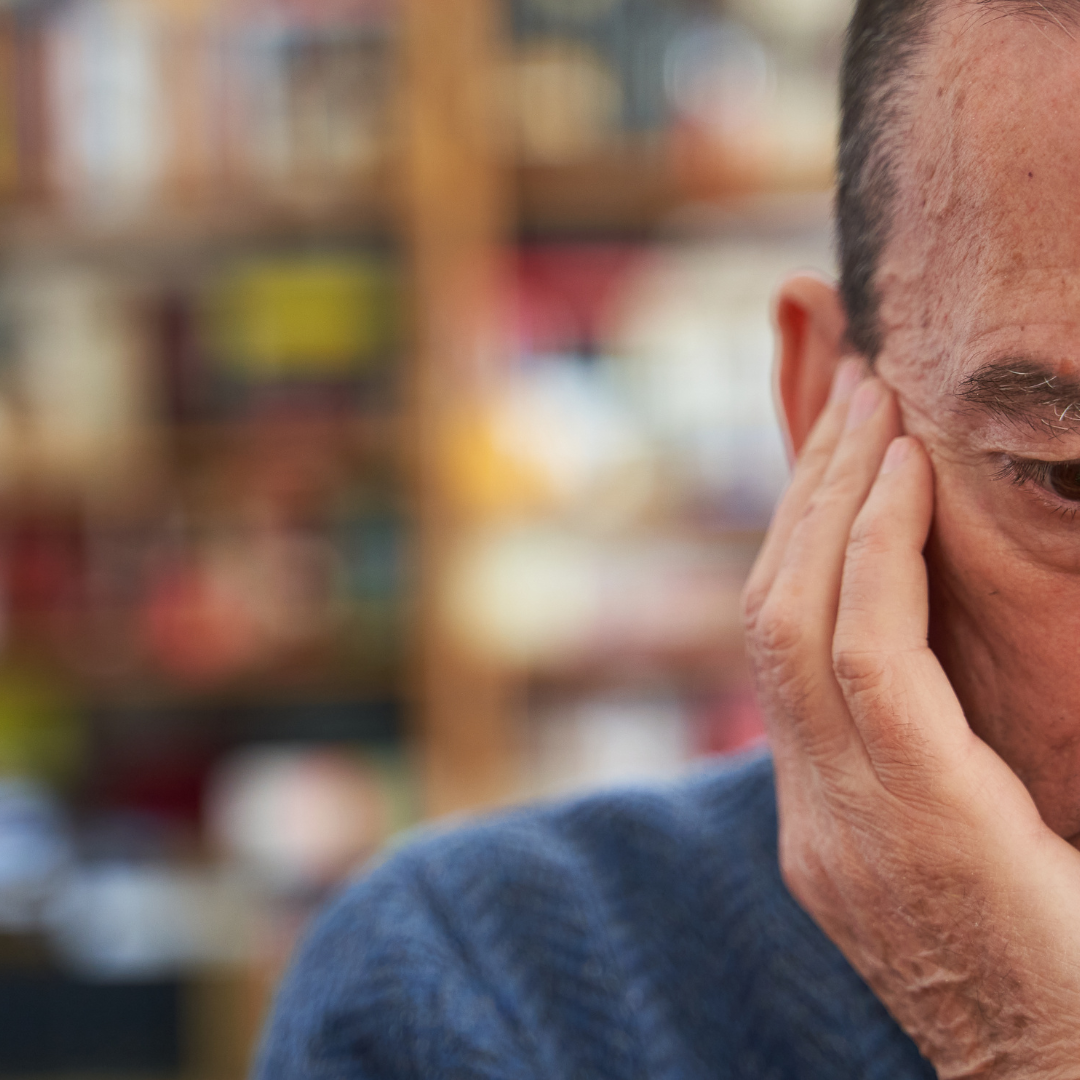 A picture of a man thinking about his memory loss symptoms - cover-image